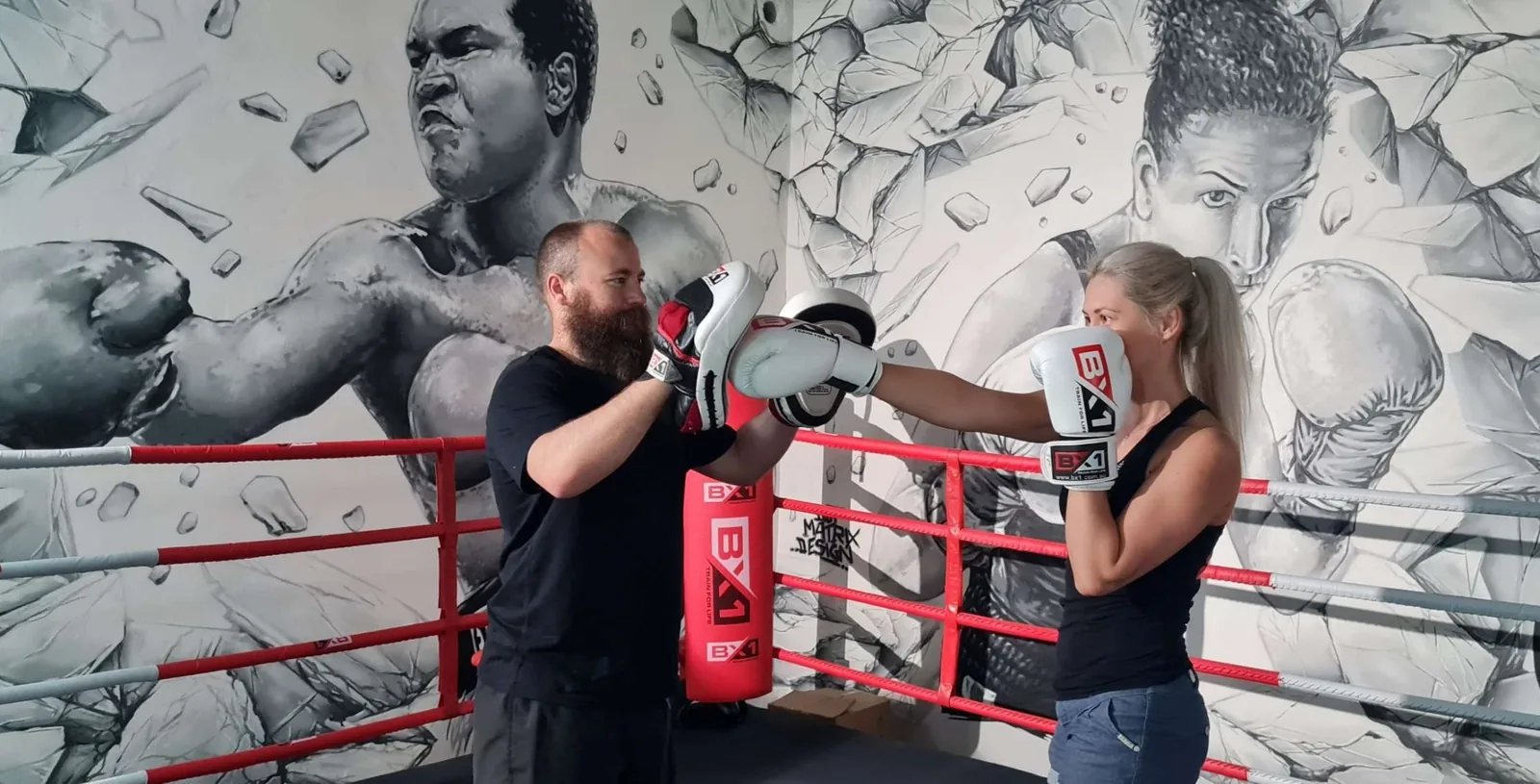 Coach-led pad training in the ring at BX1 Gym Neutral Bay