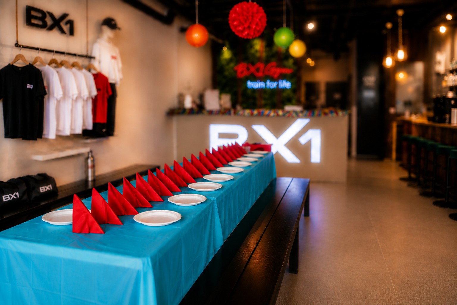 BX1 birthday party setup with the downstairs party area and upstairs food service and lounge