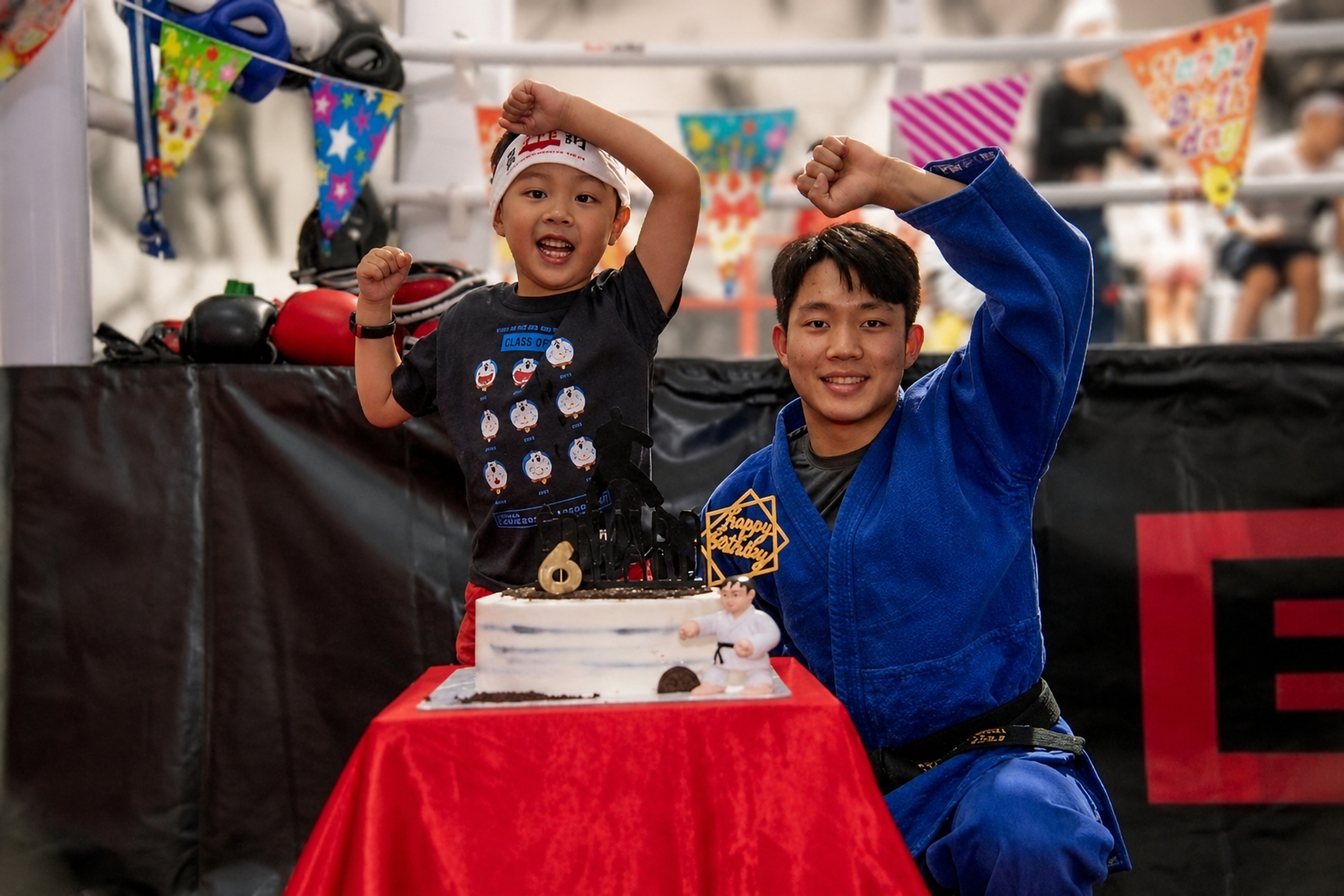 Birthday child during the supervised Samurai Sword Cake Cutting Ceremony at BX1